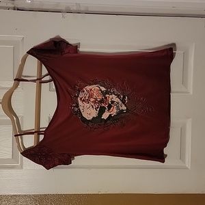 Off the shoulder skull shirt with lace arms.